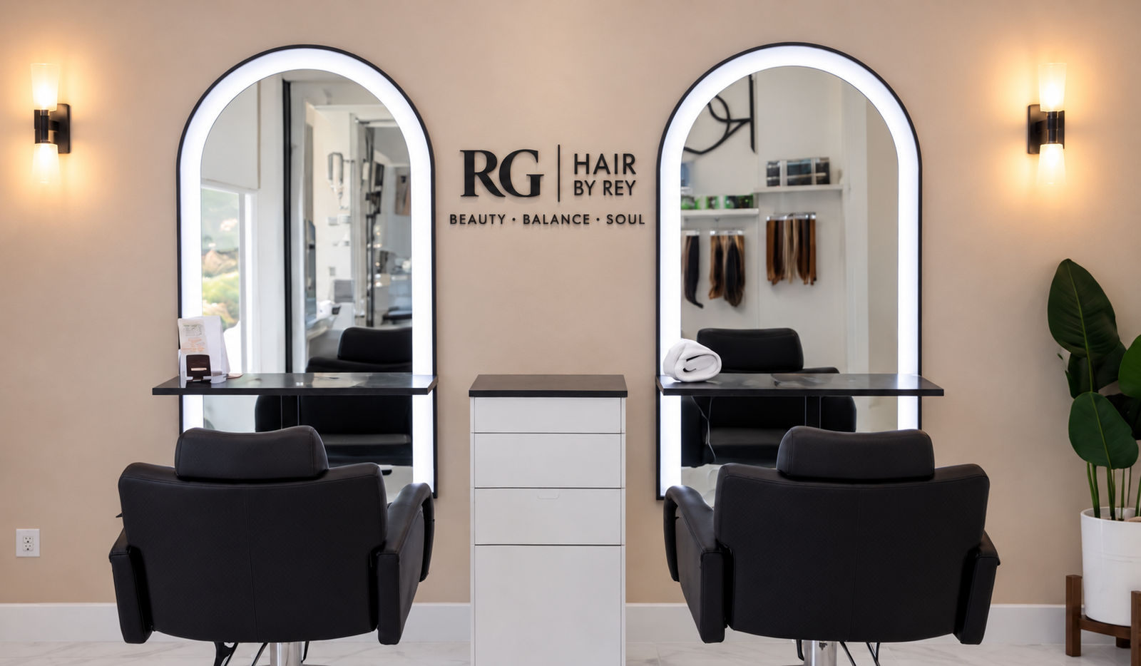 RG Hair by Rey studio with illuminated mirrors and the approved wall-logo mockup